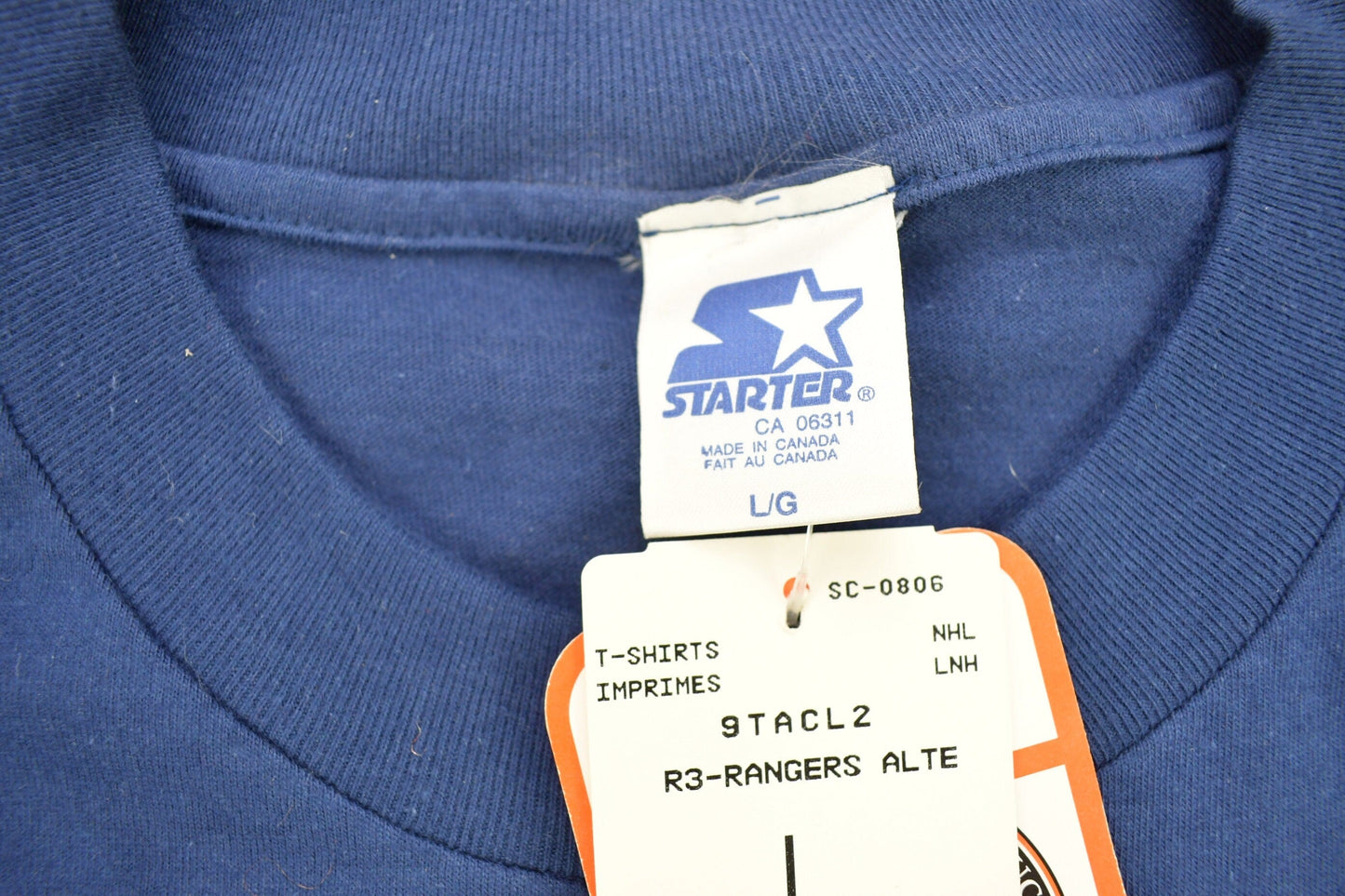 Starter Clothing > Gender Neutral Adult Clothing > Tops & Tees > T Shirts Vintage 1990s Deadstock New York Rangers NHL Starter T-ShirtMen's Large