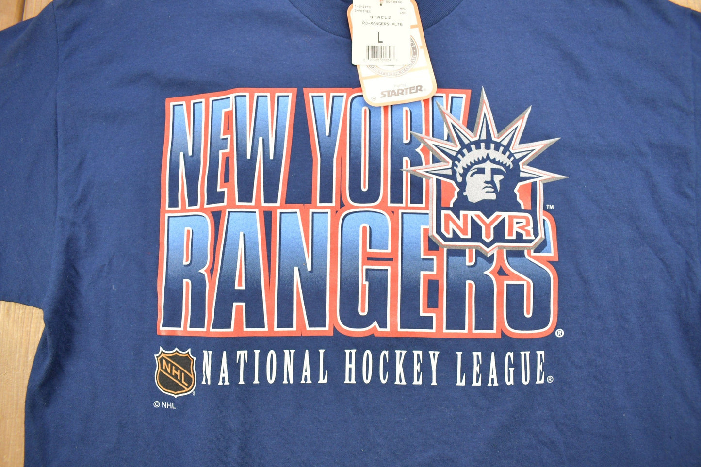 Starter Clothing > Gender Neutral Adult Clothing > Tops & Tees > T Shirts Vintage 1990s Deadstock New York Rangers NHL Starter T-ShirtMen's Large