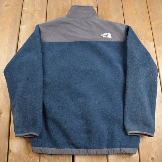 The North Face Clothing > Gender Neutral Adult Clothing > Hoodies & Sweatshirts > Sweatshirts Vintage 1990s Navy Blue North Face Denali Fleece Boys Sweater Men's Medium