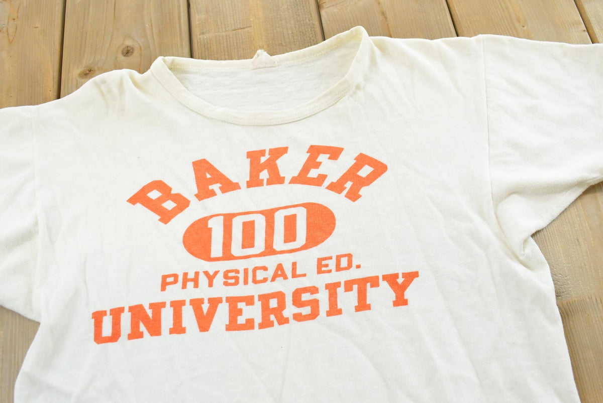 True Vintage 1960s Champion Baker University Physical Education Collegiate T-Shirt Mens M from propervintagecanada