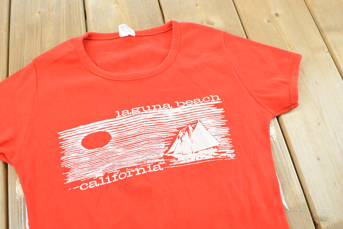 True Vintage 1970s Laguna Beach Sailboat Fun-Tees Souvenir Baby Tee T-Shirt Women's S from propervintagecanada