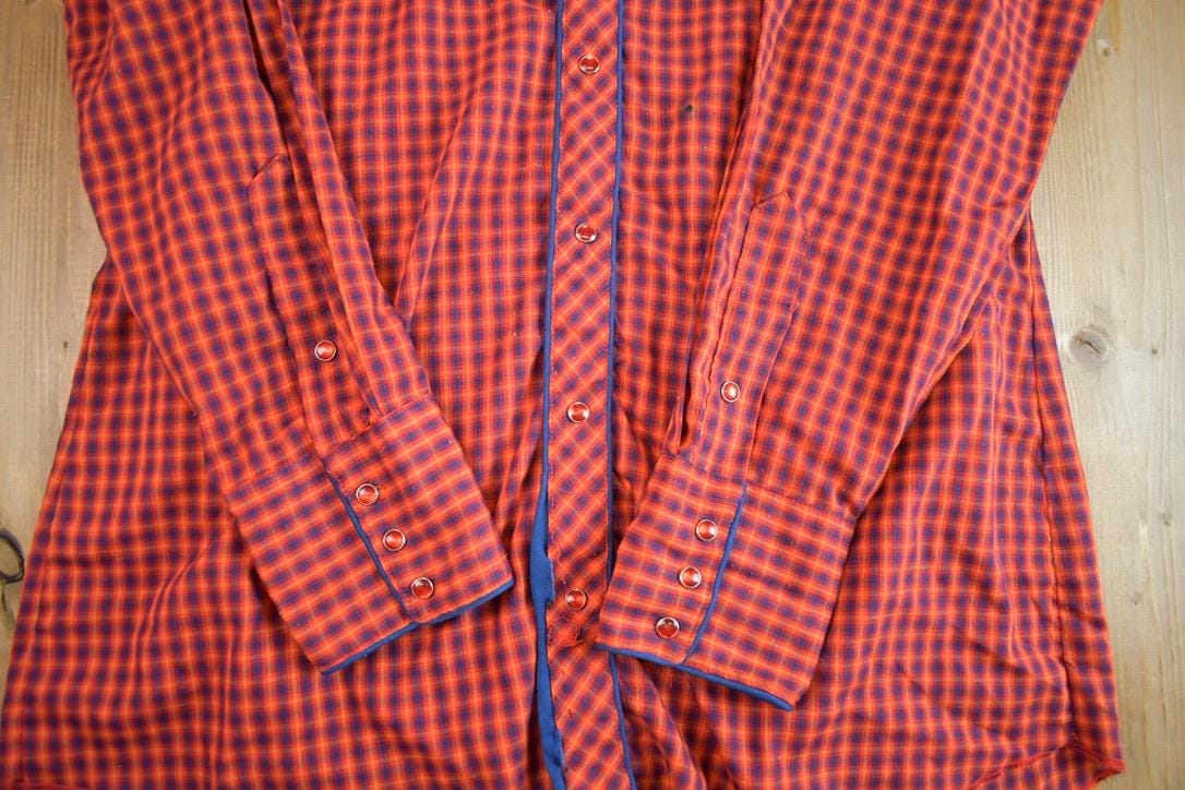 True Vintage 1980s JCPenny Western Apparel Western Cowboy Long Tail Button Up Shirt Men's XL from propervintagecanada