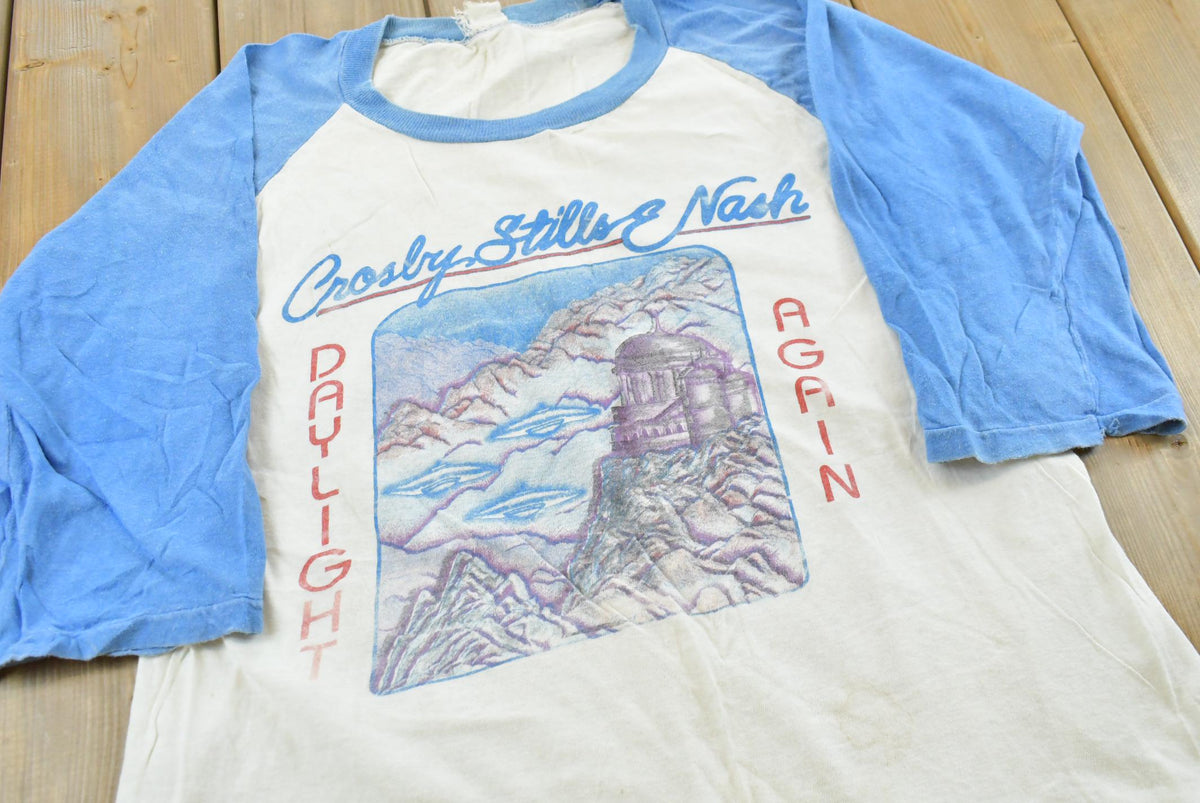 True Vintage 1985 Crosby Stills Nash Daylight Again Tour Raglan T-Shirt Men's M from propervintagecanada