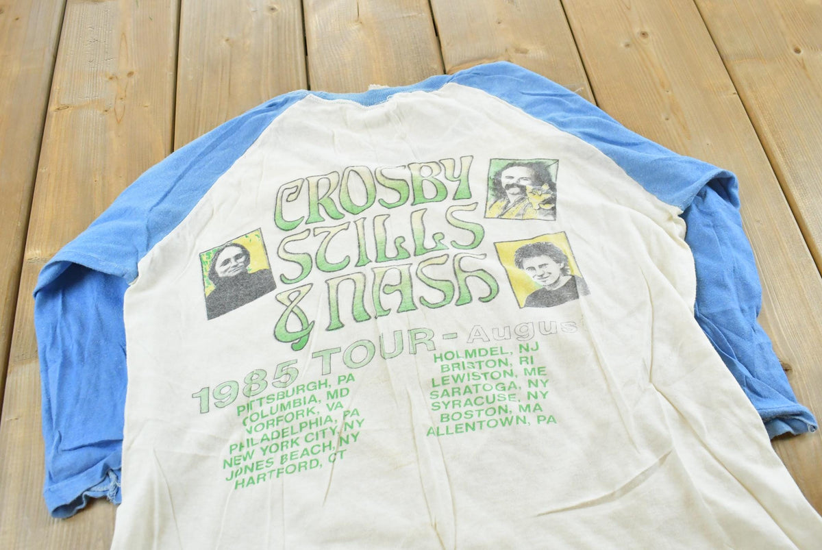 True Vintage 1985 Crosby Stills Nash Daylight Again Tour Raglan T-Shirt Men's M from propervintagecanada