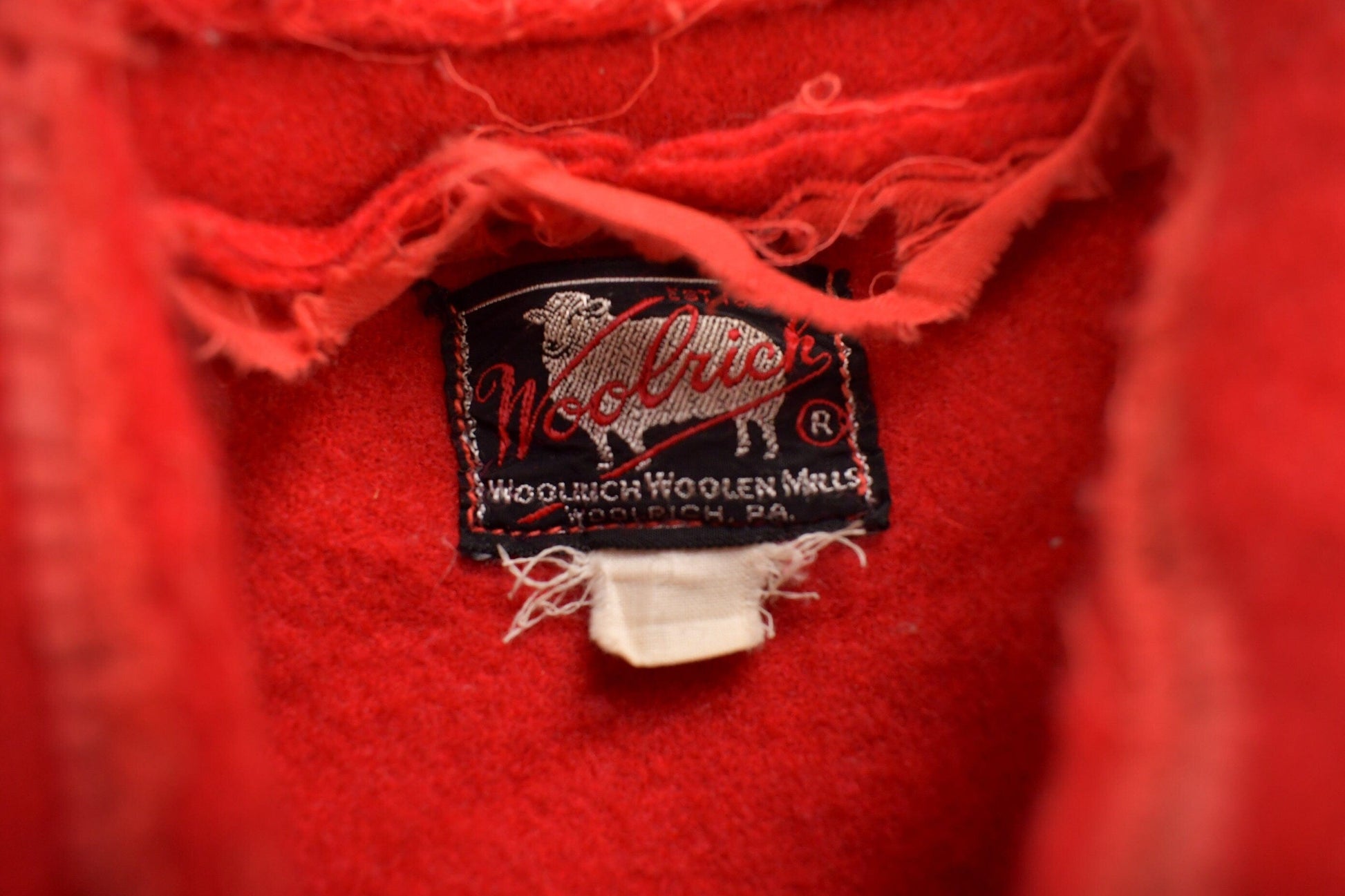 Vintage 1950s Woolrich Red Wool Button Up Shirt Men's Large from propervintagecanada