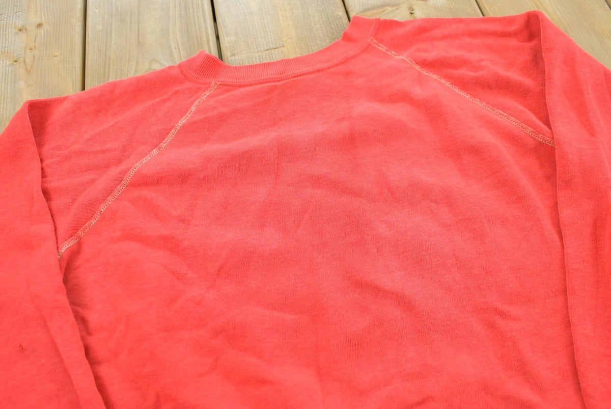 Vintage 1960s Blank Red Raglan Crewneck Sweatshirt Mens S from propervintagecanada