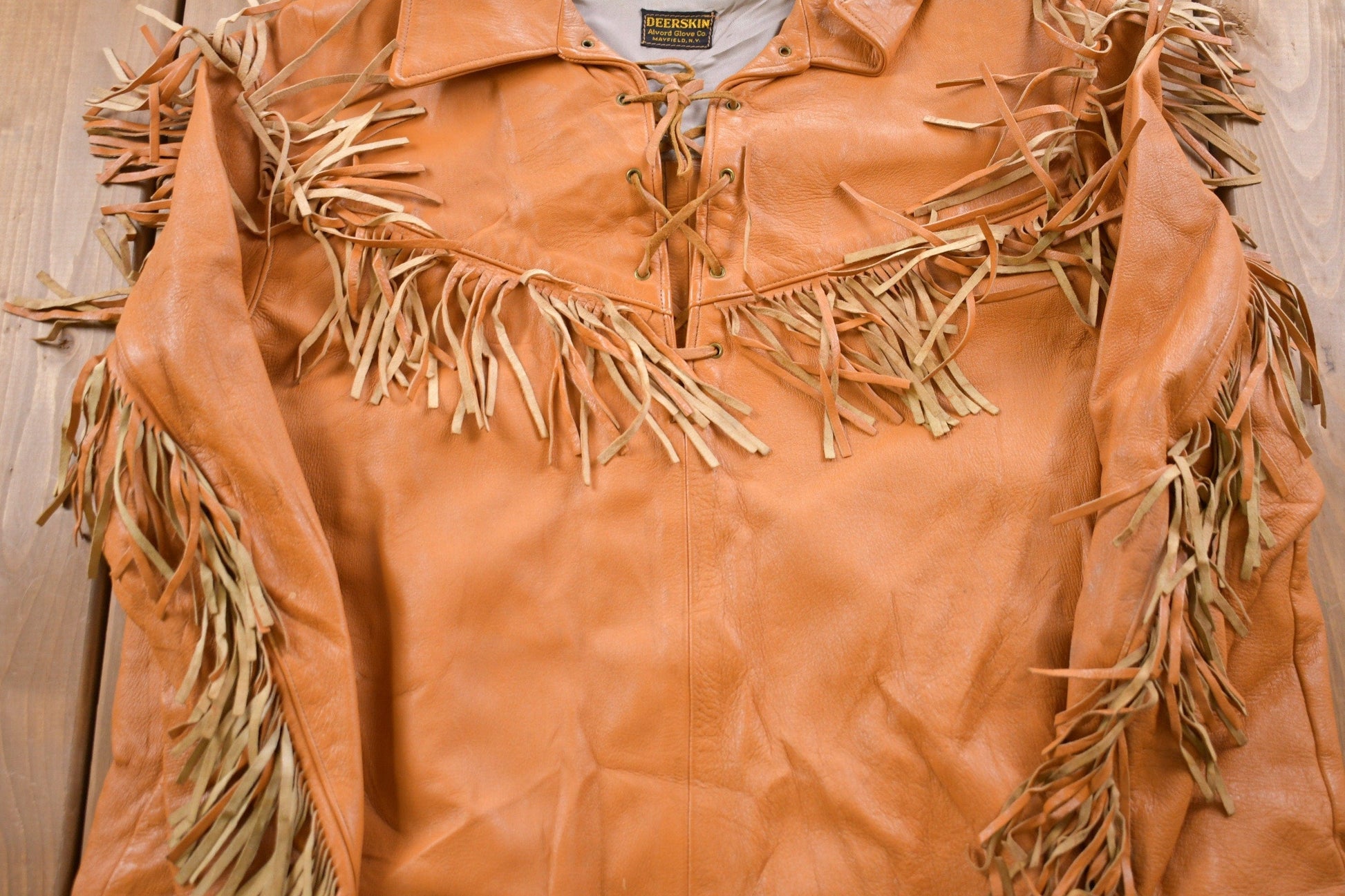 Vintage 1960s Deerskin Leather Pullover Fringe Jacket Women's M from propervintagecanada