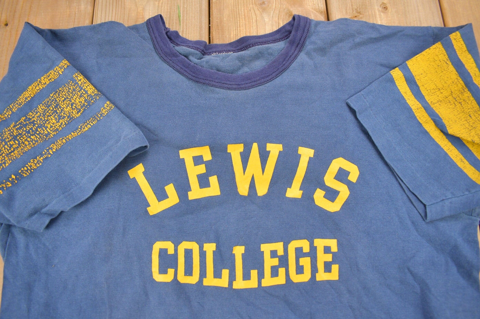 Vintage 1960s Fort Lewis College Collegiate Jersey T-Shirt Men's Large from propervintagecanada