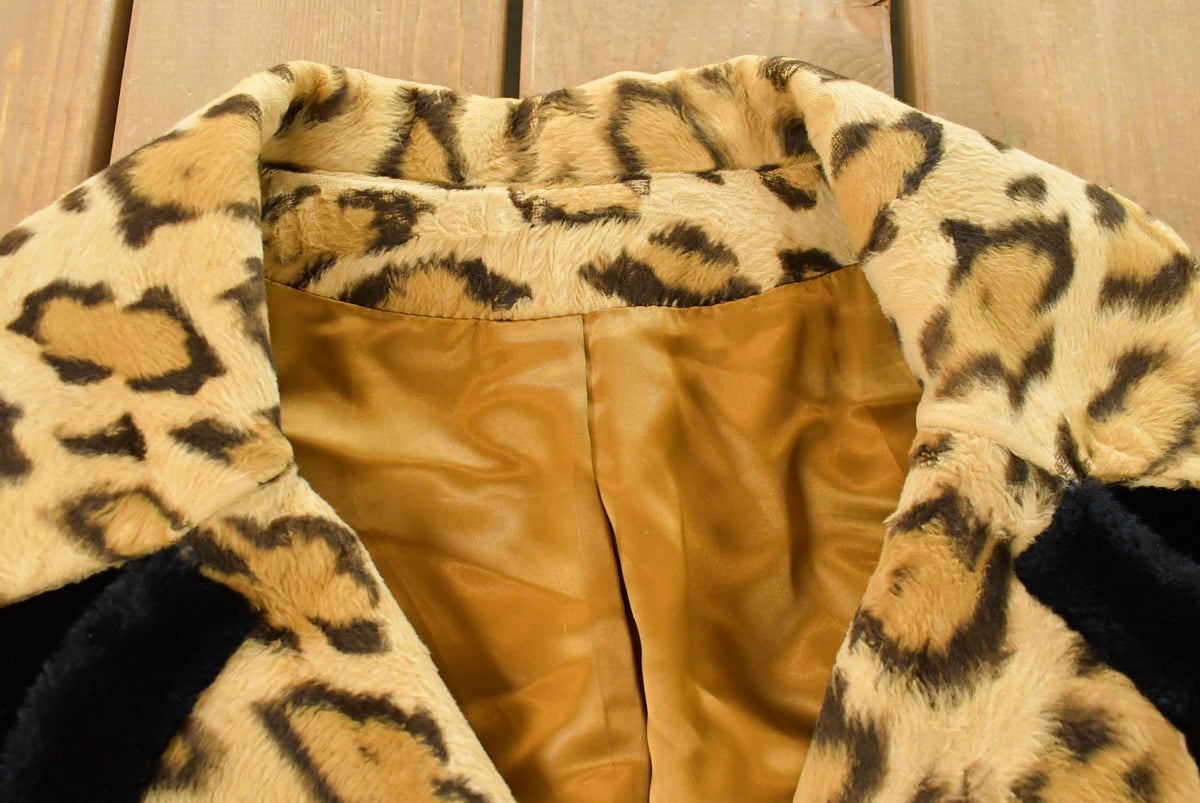 Vintage 1960s Fredric Cleveland Faux Leopard Print Fur Coat Women's M from propervintagecanada