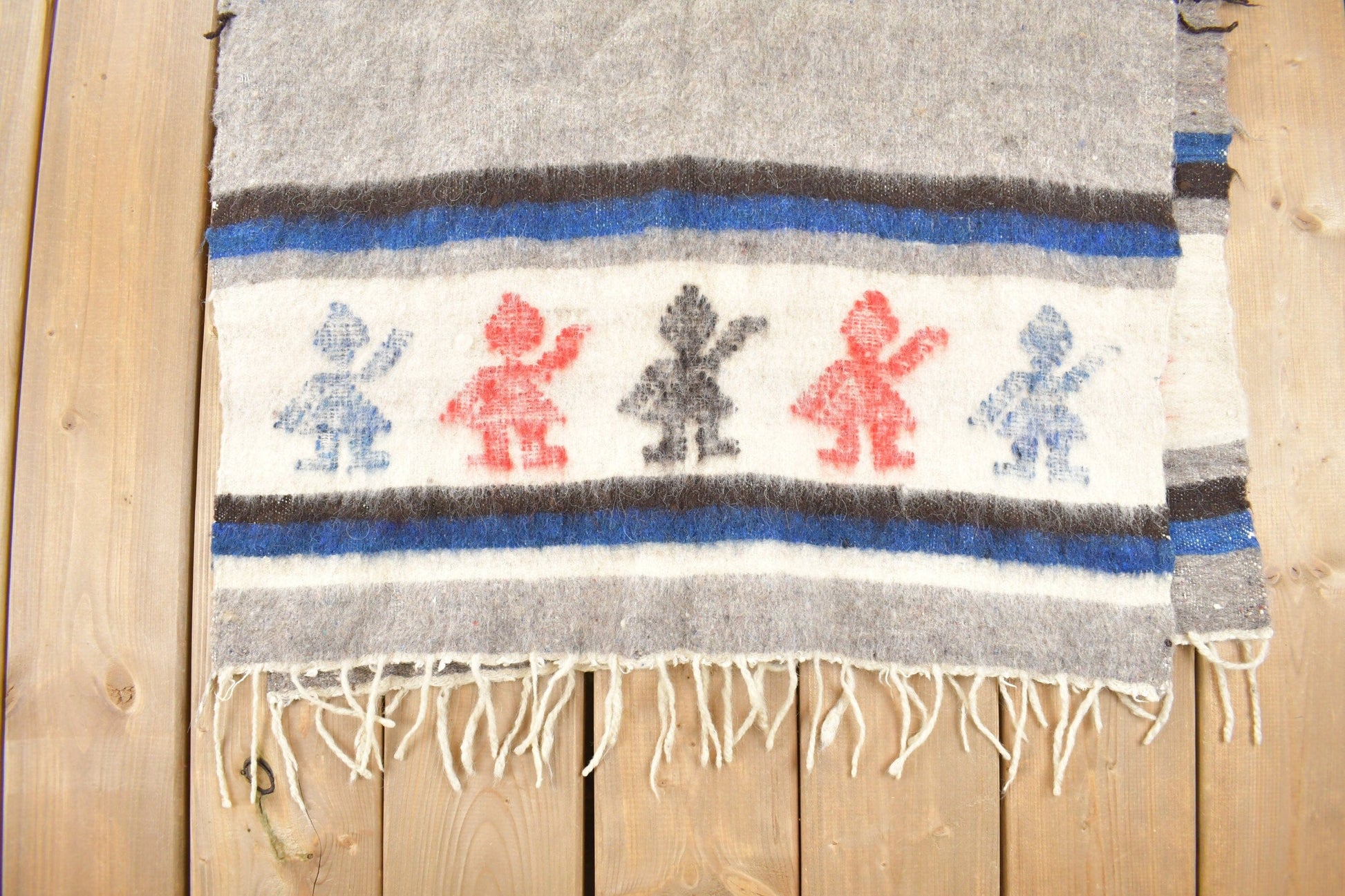 Vintage 1960s Mexican Rug Knit Poncho from propervintagecanada