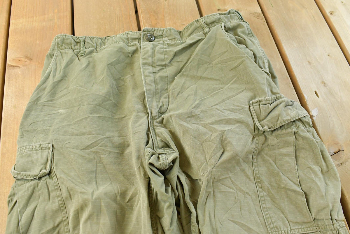 Vintage 1960s Military OG-107 Starched Sateen Fatigue Cargo Pants Men's 32 x 29 from propervintagecanada