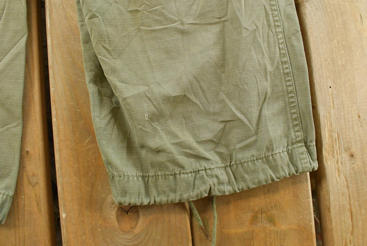 Vintage 1960s Military OG-107 Starched Sateen Fatigue Cargo Pants Men's 32 x 29 from propervintagecanada