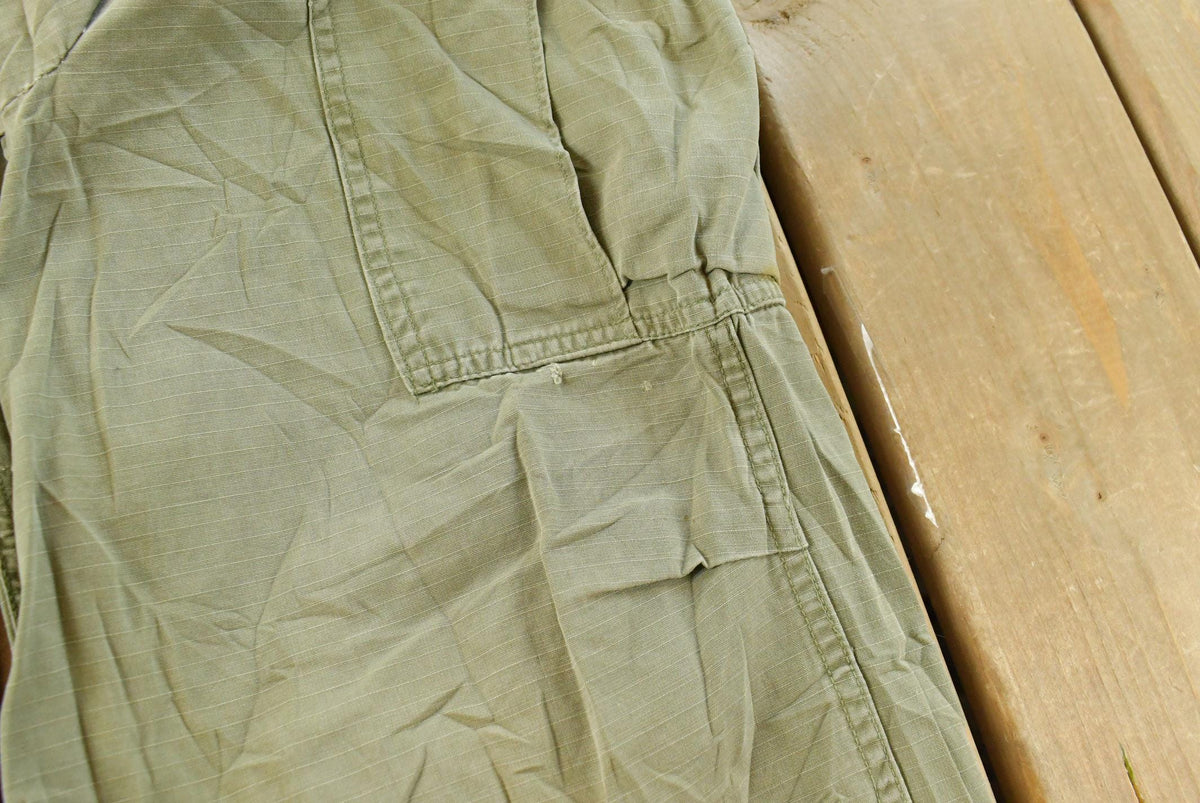 Vintage 1960s Military OG-107 Starched Sateen Fatigue Cargo Pants Men's 32 x 29 from propervintagecanada