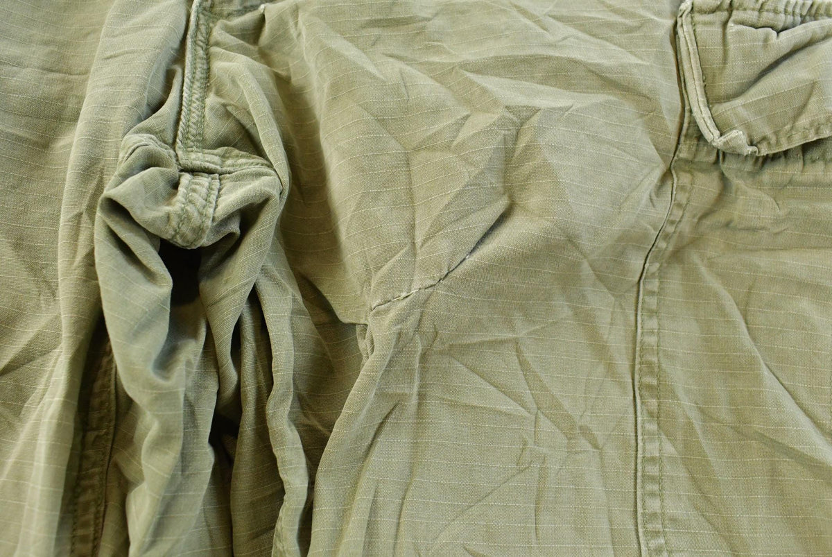Vintage 1960s Military OG-107 Starched Sateen Fatigue Cargo Pants Men's 32 x 29 from propervintagecanada