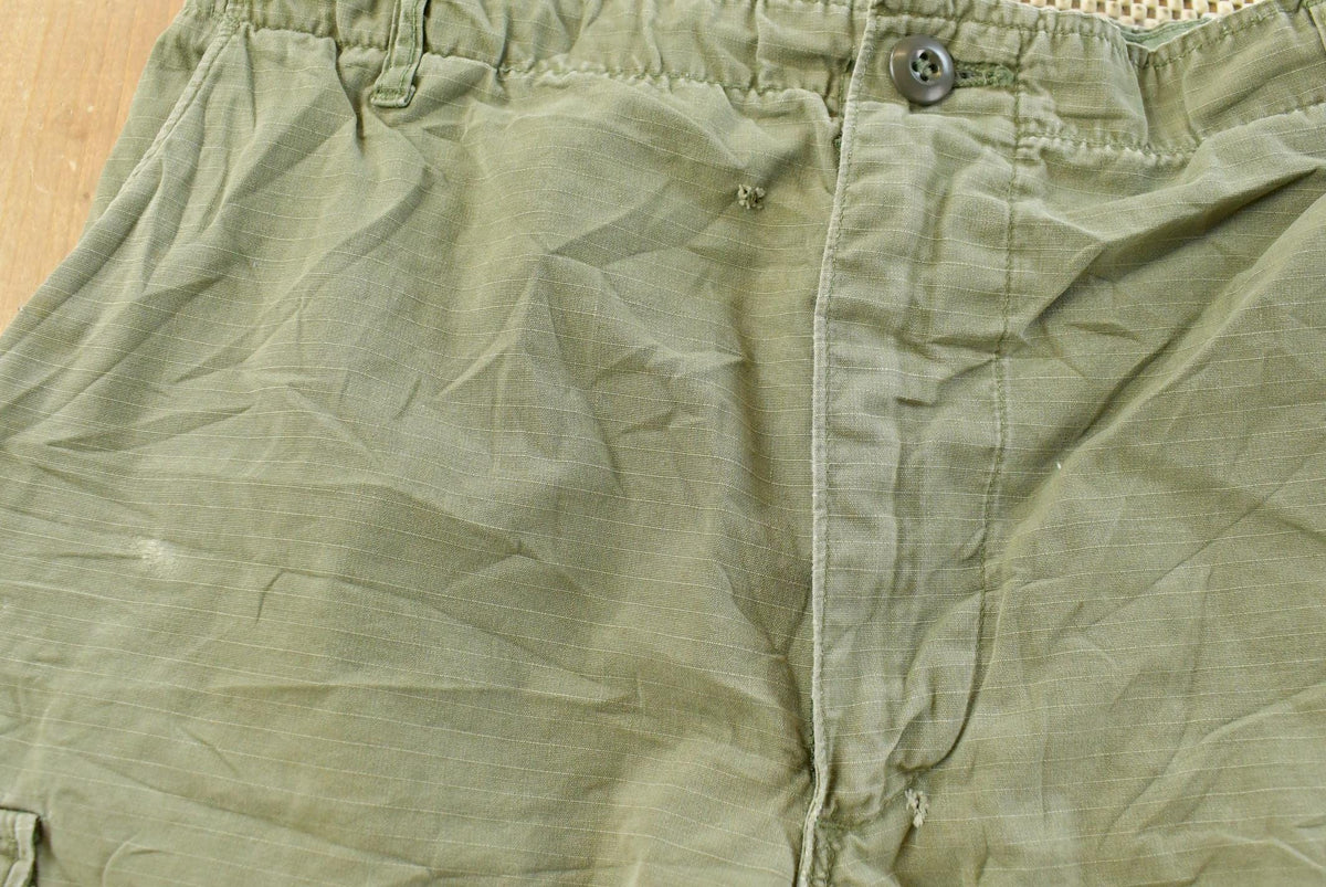 Vintage 1960s Military OG-107 Starched Sateen Fatigue Cargo Pants Men's 32 x 29 from propervintagecanada