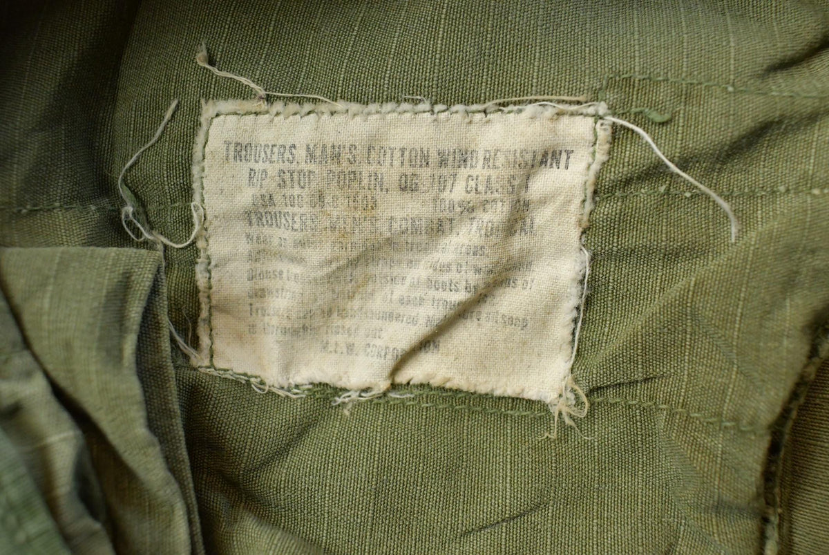 Vintage 1960s Military OG-107 Starched Sateen Fatigue Cargo Pants Men's 32 x 29 from propervintagecanada