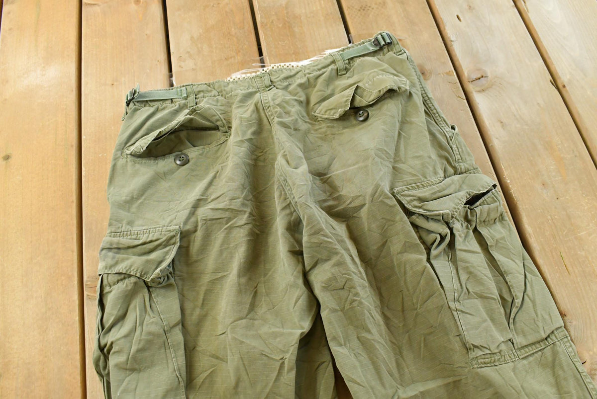 Vintage 1960s Military OG-107 Starched Sateen Fatigue Cargo Pants Men's 32 x 29 from propervintagecanada