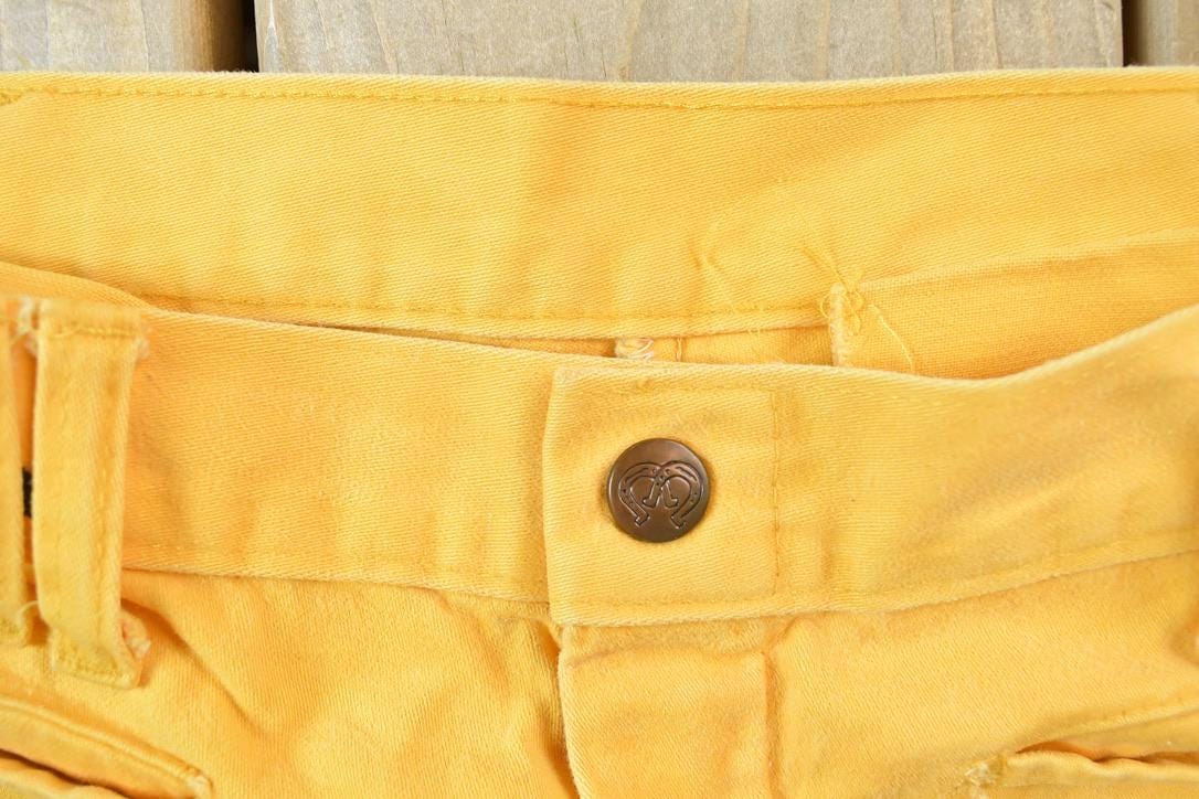 Vintage 1960s Yellow Bell Bottom Jeans Women's 30 x 29 from propervintagecanada