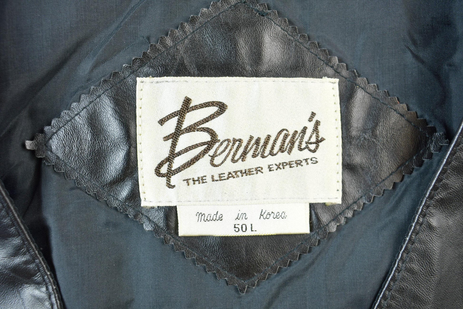 Vintage 1970s Berman's Black Leather Vest Men's Large from propervintagecanada