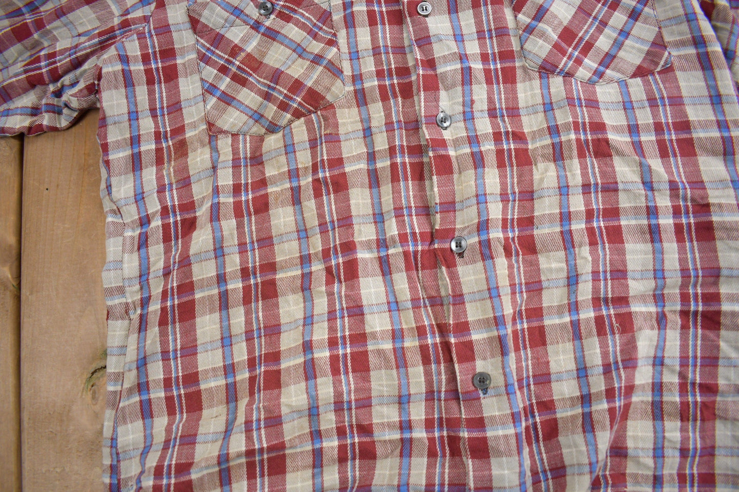 Vintage 1970s Buckeye Plaid Flannel Button Up Shirt Men's XL from propervintagecanada