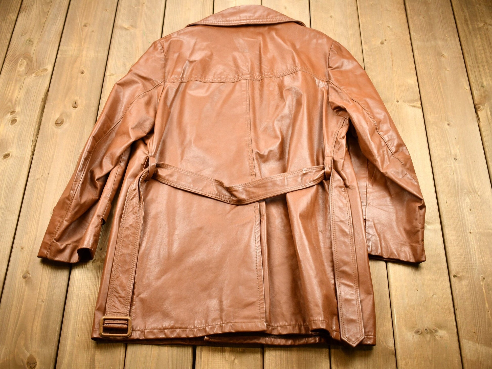 Vintage 1970s Burnt Orange Full Length Leather Trench Coat Men's XL from propervintagecanada