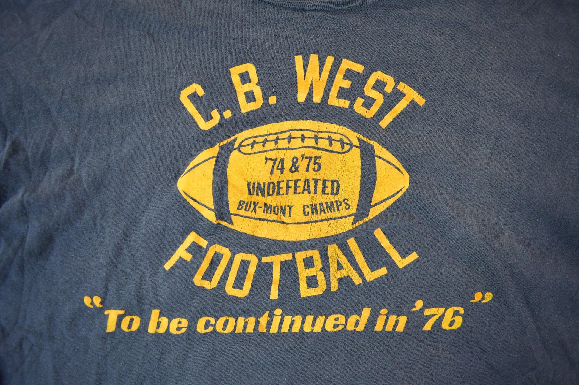 Vintage 1970s C.B. West Football Champion T Shirt Men's Medium from propervintagecanada