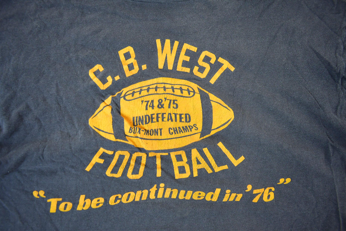 Vintage 1970s C.B. West Football Champion T Shirt Men's Small from propervintagecanada