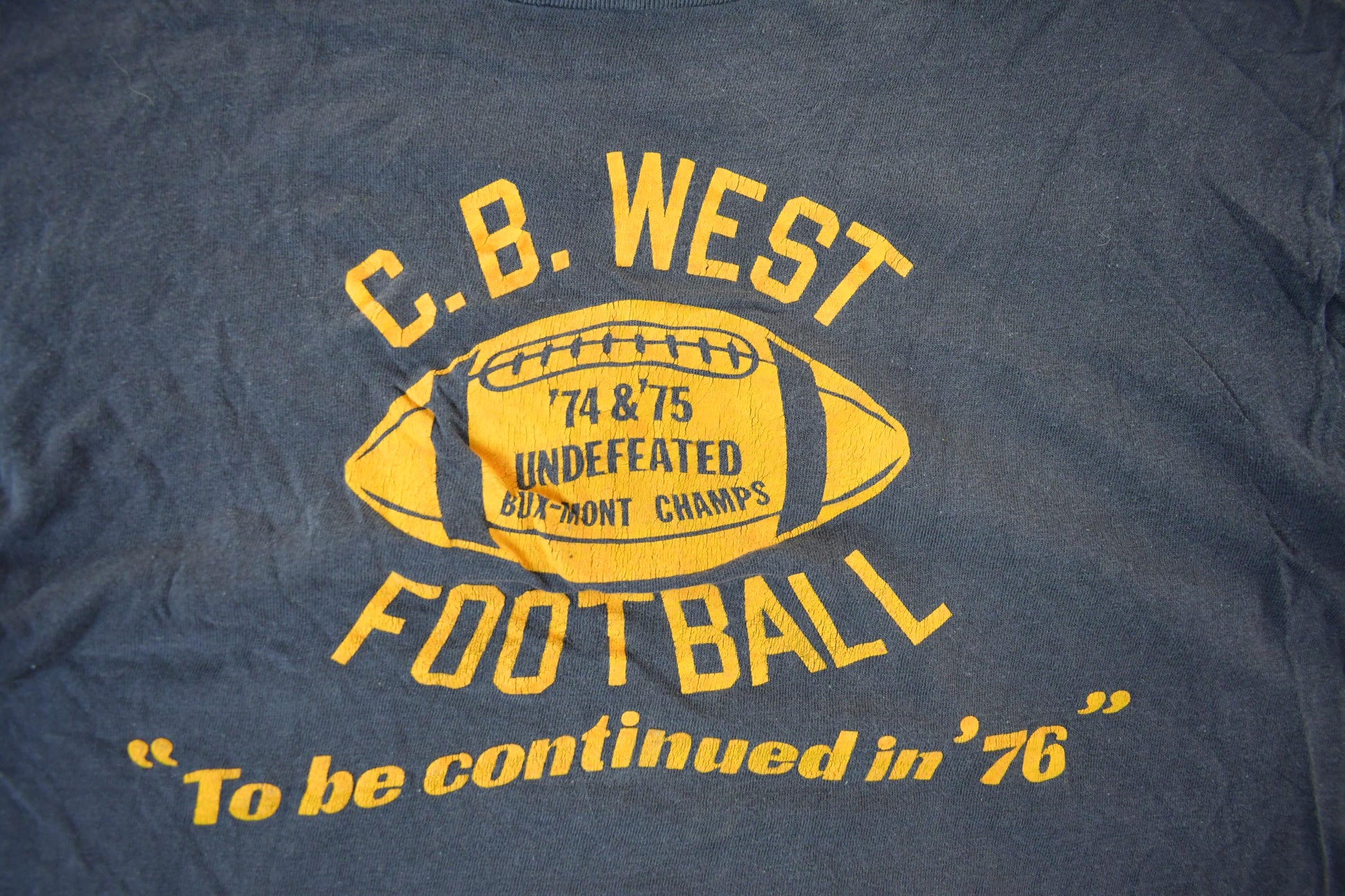 Vintage 1970s C.B. West Football Champion T Shirt Men's Small from propervintagecanada