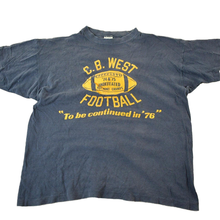 Vintage 1970s C.B. West Football Champion T Shirt Men's Small from propervintagecanada