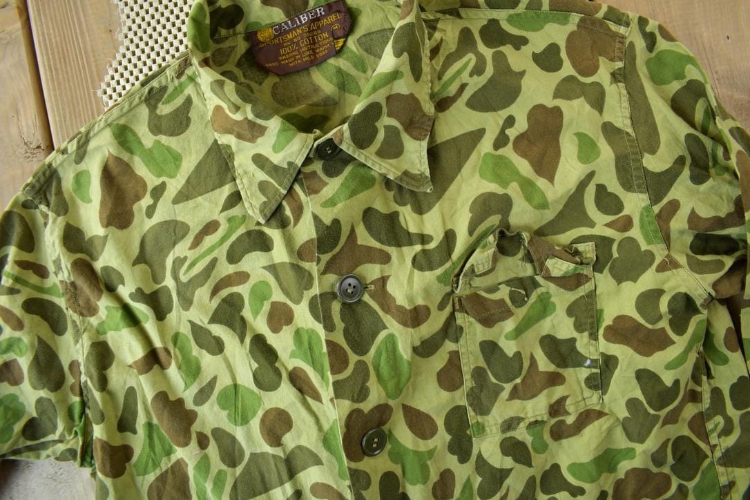 Vintage 1970s Caliber Duck Camo Button Up Shirt Men's Medium from propervintagecanada