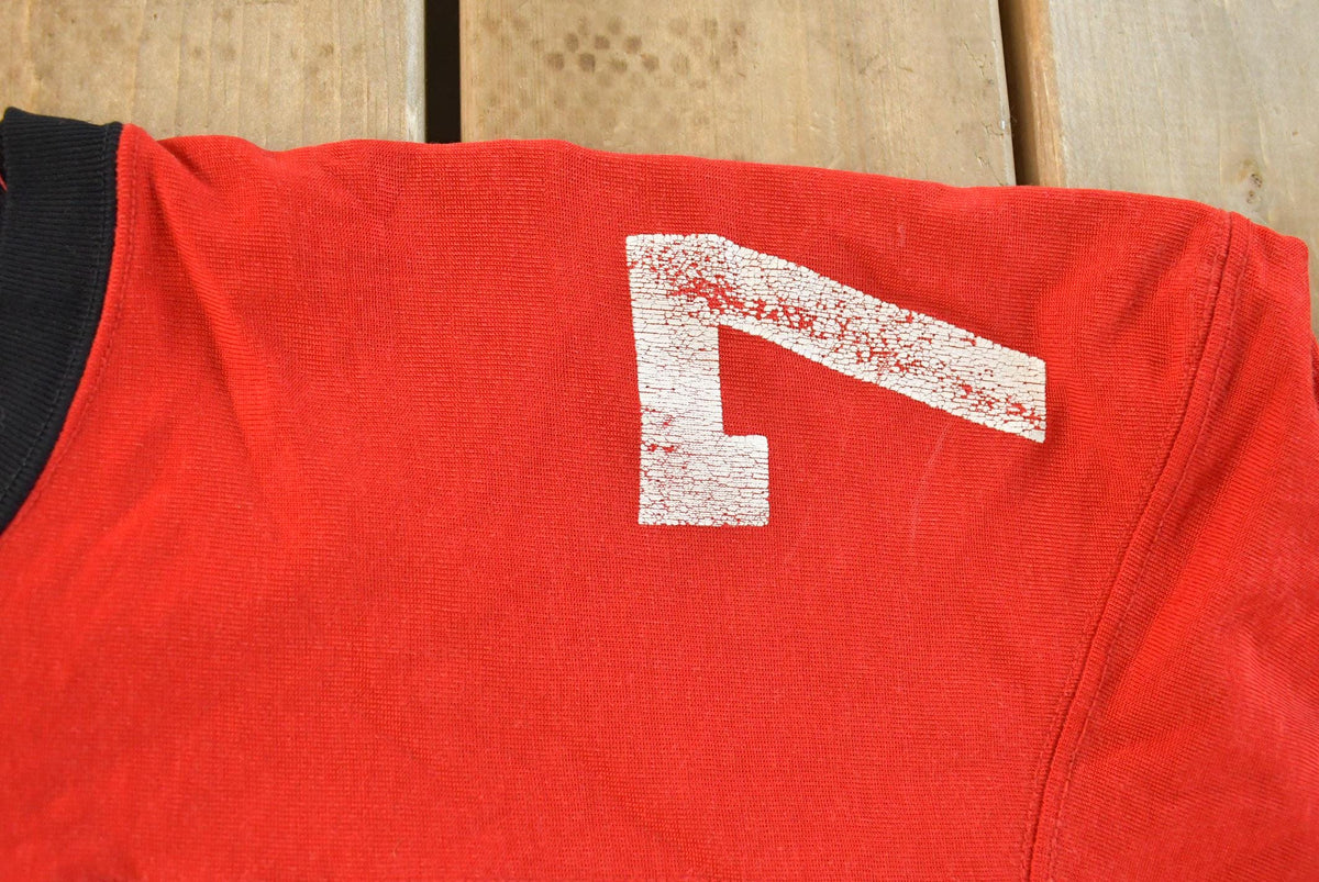 Vintage 1970s Champion East #70 Football Jersey Men's XL from propervintagecanada