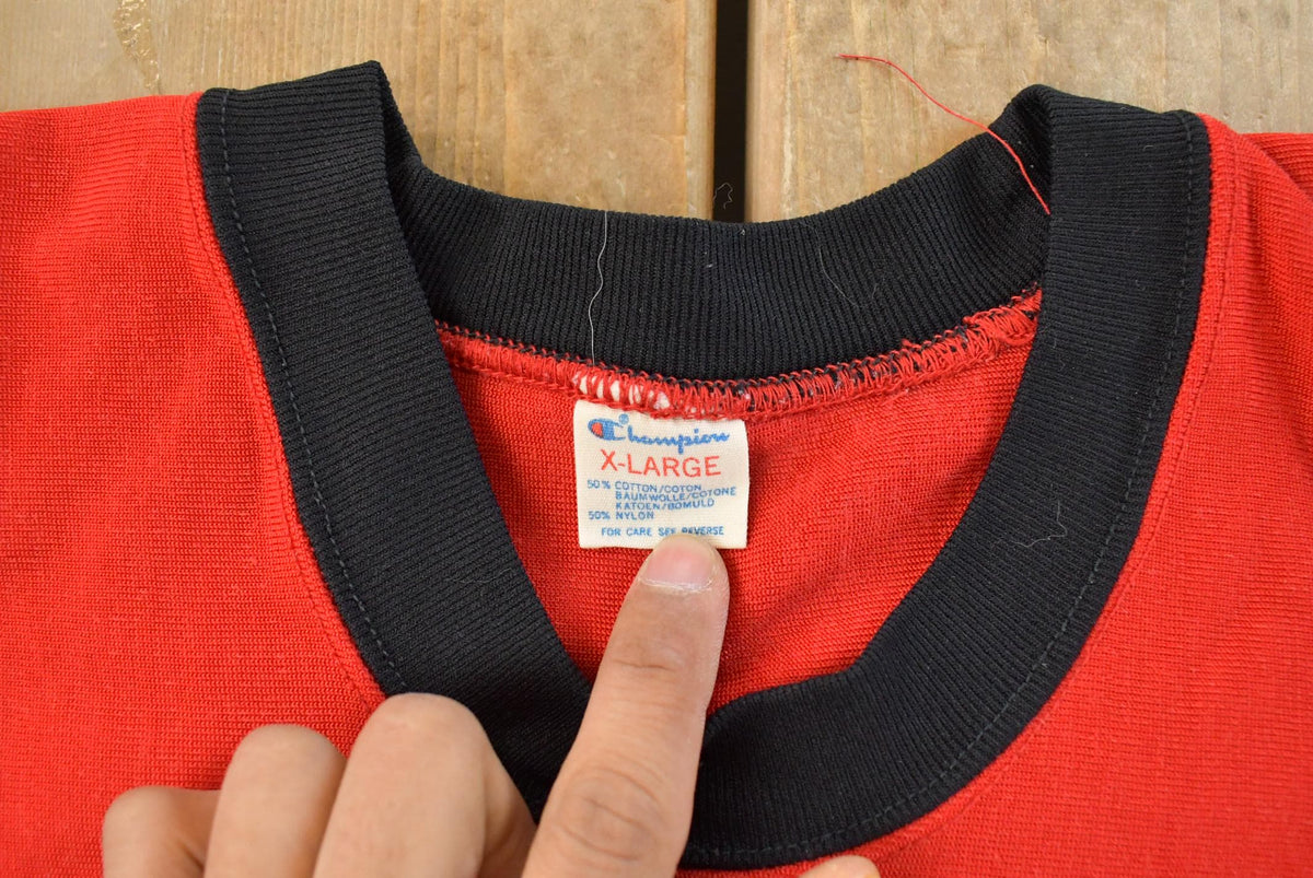 Vintage 1970s Champion East #70 Football Jersey Men's XL from propervintagecanada