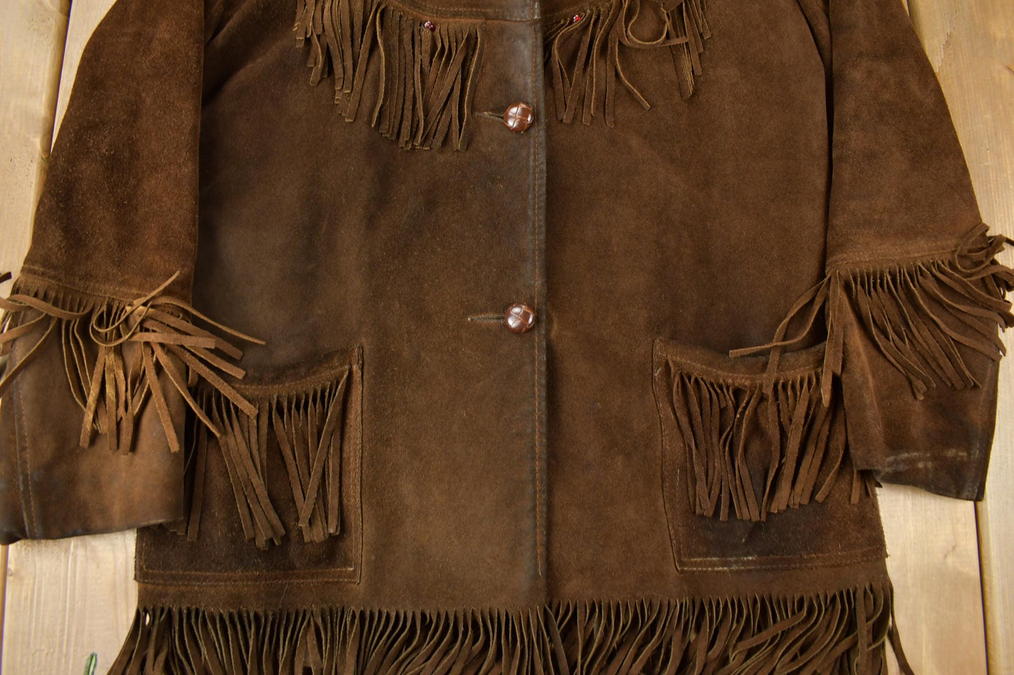 Vintage 1970s Dark Brown Suede Fringe Leather Jacket Men's Medium from propervintagecanada