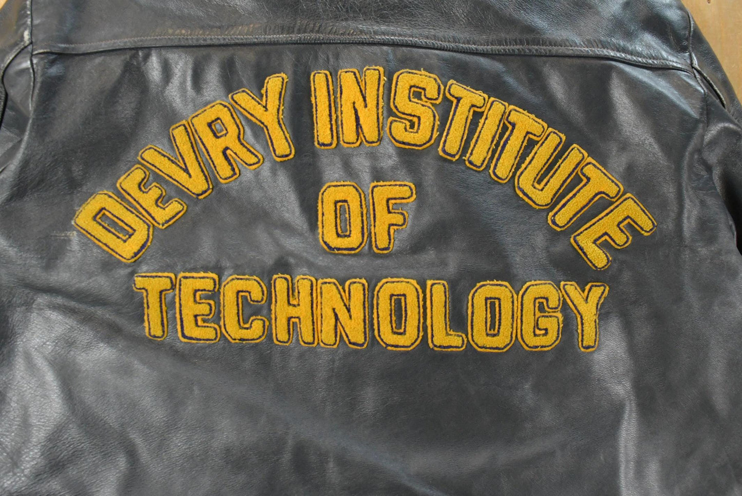 Vintage 1970s DeVry Institute of Technology Collegiate Lined Leather Jacket Men's Large from propervintagecanada