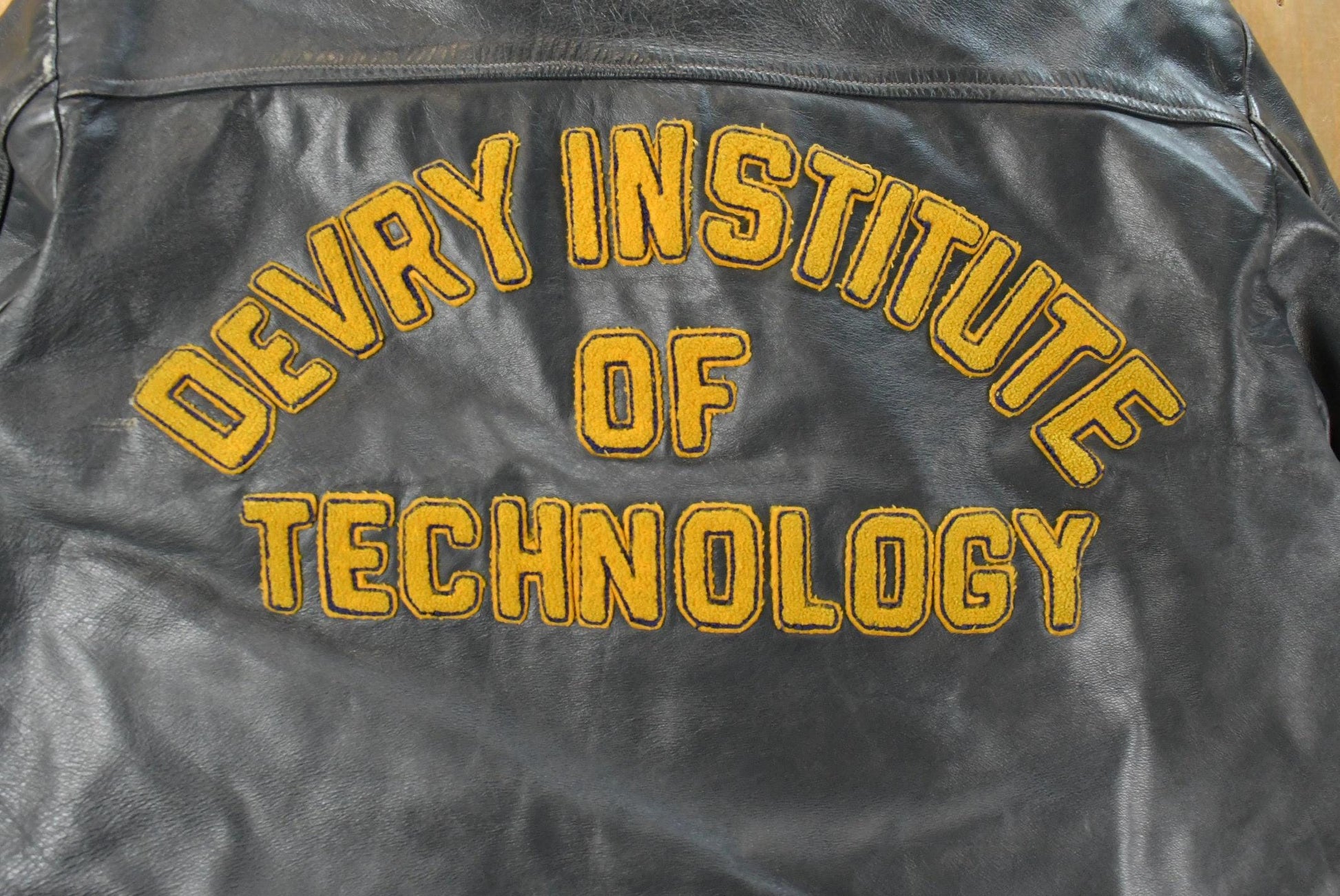Vintage 1970s DeVry Institute of Technology Collegiate Lined Leather Jacket Men's Large from propervintagecanada