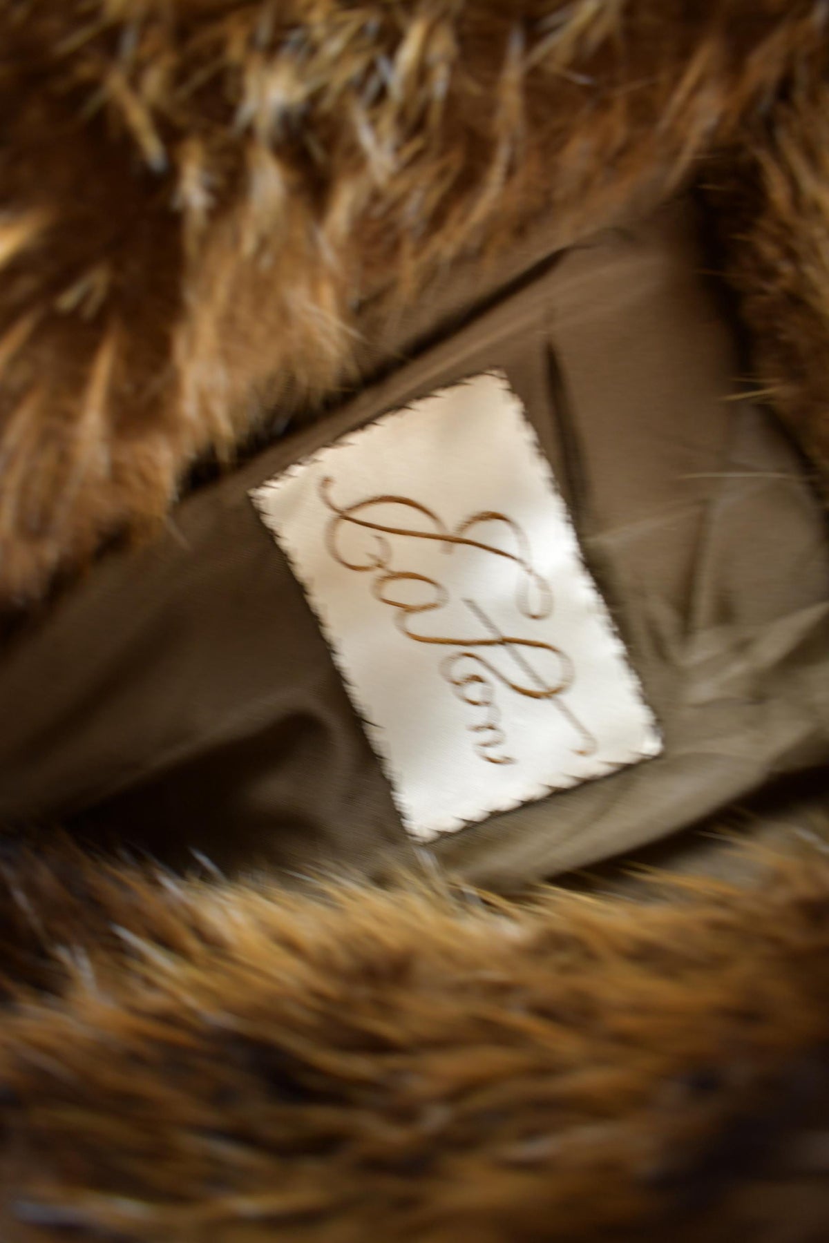 Vintage 1970s Eaton Full Length Brown Raccoon Fur Coat from propervintagecanada