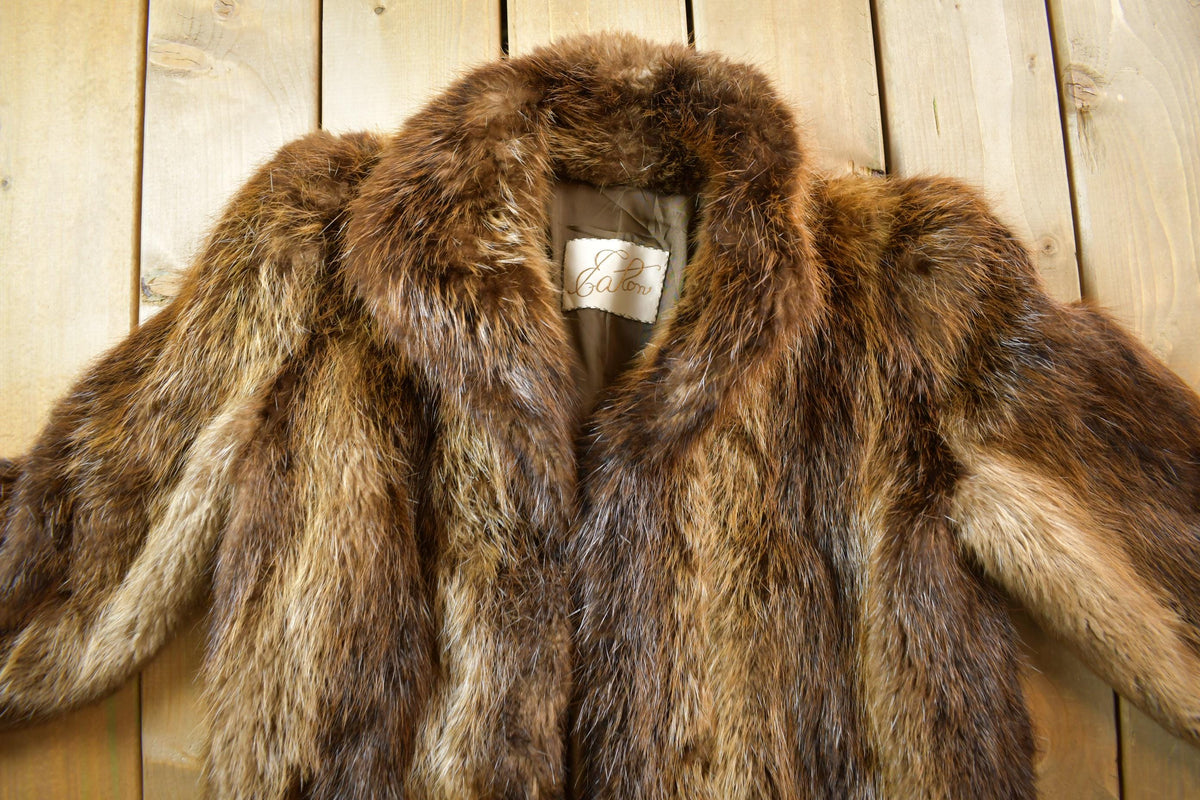 Vintage 1970s Eaton Full Length Brown Raccoon Fur Coat from propervintagecanada