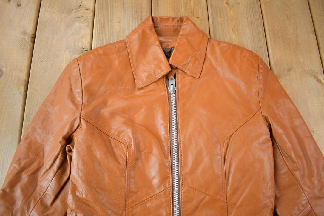 Vintage 1970s Golden Crown By Bristol Burnt Orange Leather Coat Women's S from propervintagecanada