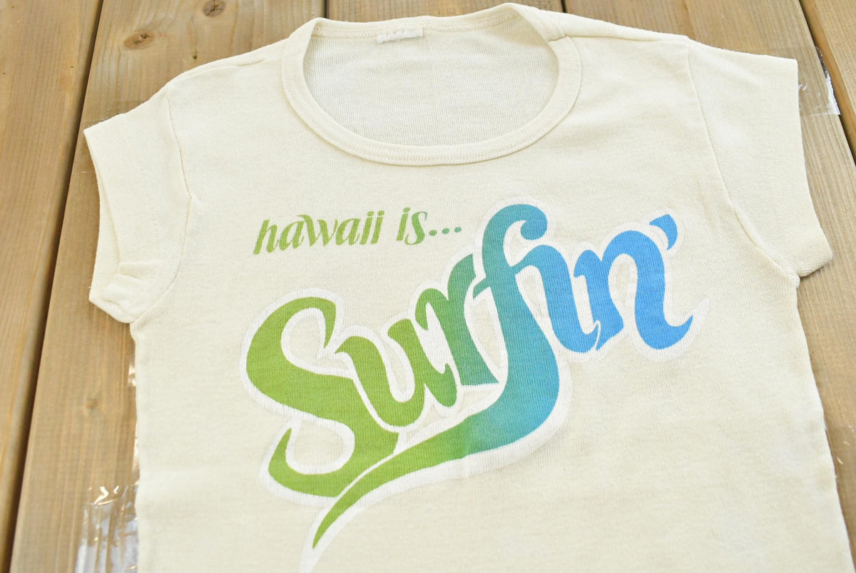 Vintage 1970s Hawaii Surfin Souvenir Baby Tee Womens XS from propervintagecanada