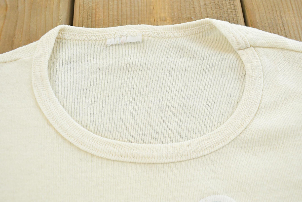 Vintage 1970s Hawaii Surfin Souvenir Baby Tee Womens XS from propervintagecanada