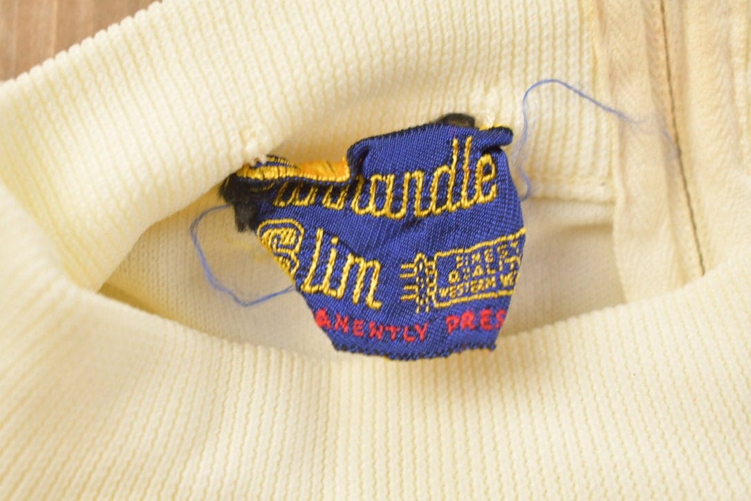 Vintage 1970s Knit Crewneck Sweater Vest Men's Small from propervintagecanada