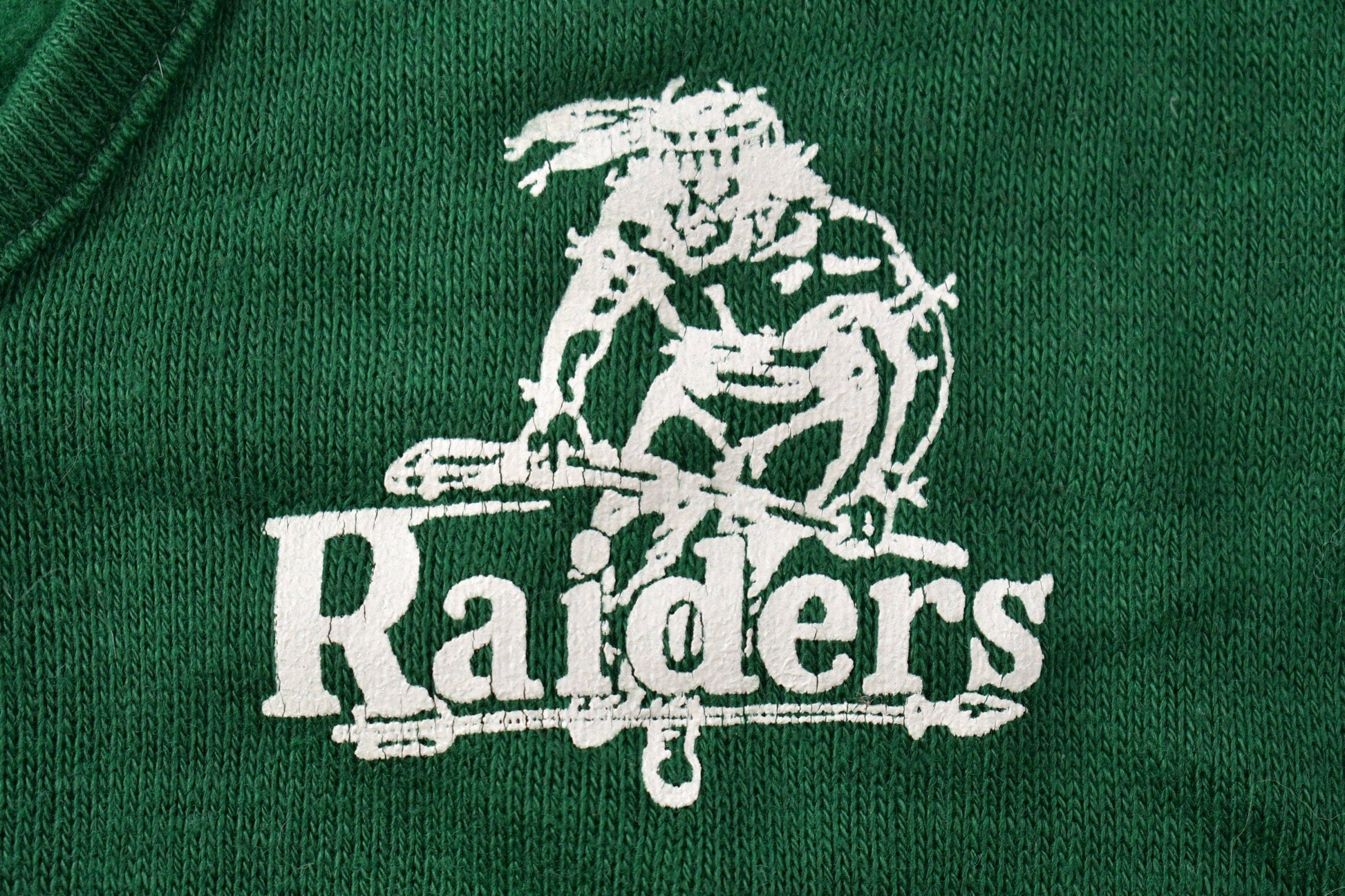 Vintage 1970s Knitted Raiders V Neck Sweater Men's Small from propervintagecanada