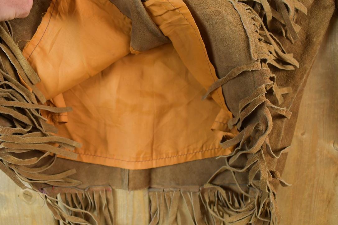 Vintage 1970s Leather Western Fringe Jacket Made In USA from propervintagecanada