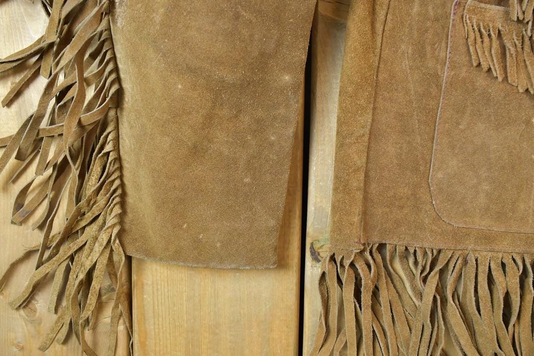 Vintage 1970s Leather Western Fringe Jacket Made In USA from propervintagecanada
