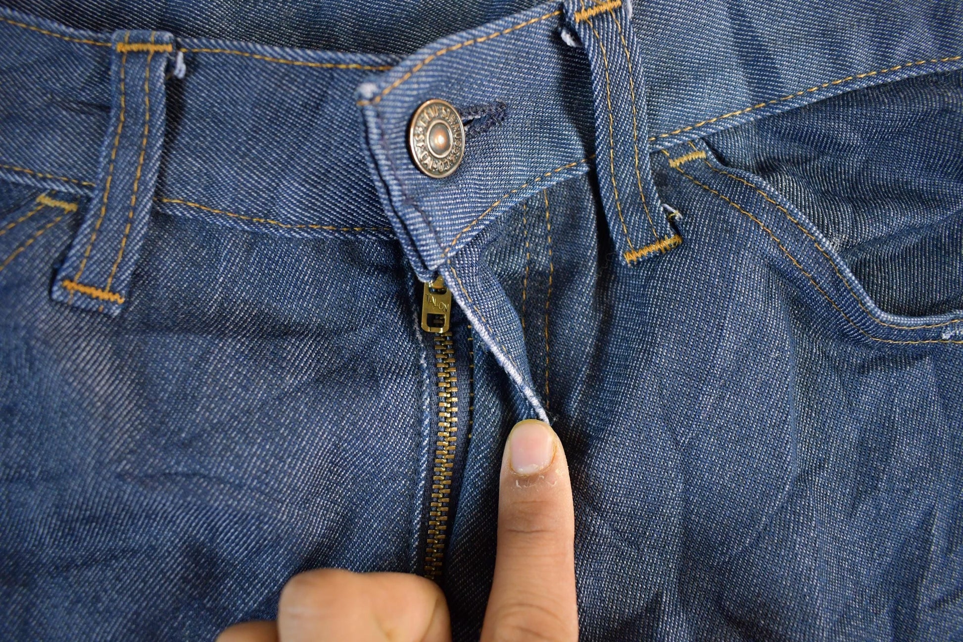 Vintage 1970s Levi's Orange Tab Bell Bottom Flare Denim Jeans Men's Medium 33 x 29 from propervintagecanada