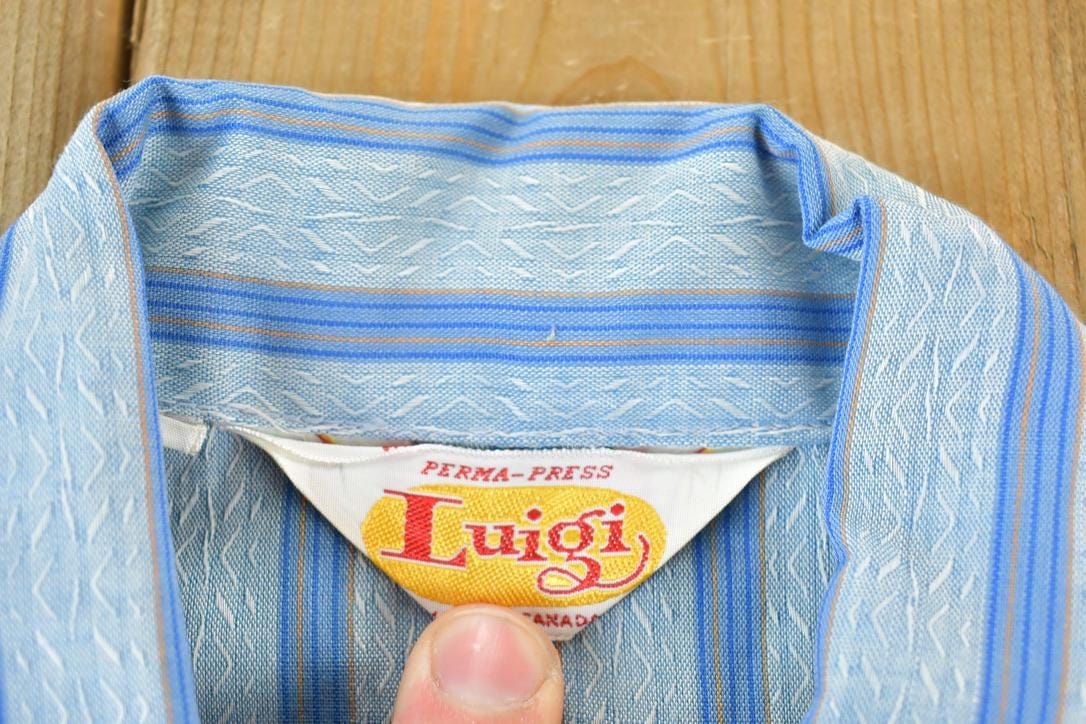 Vintage 1970s Luigi Striped Blue Button Up Shirt Men's Large from propervintagecanada