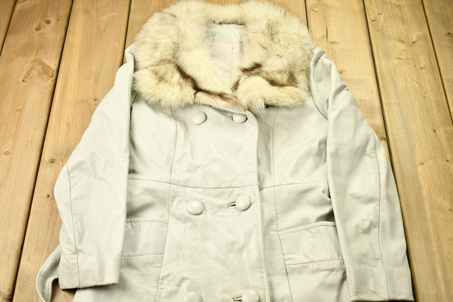 Vintage 1970s Off White Leather With Grey Fox Trim Penny Lane Trench Coat from propervintagecanada