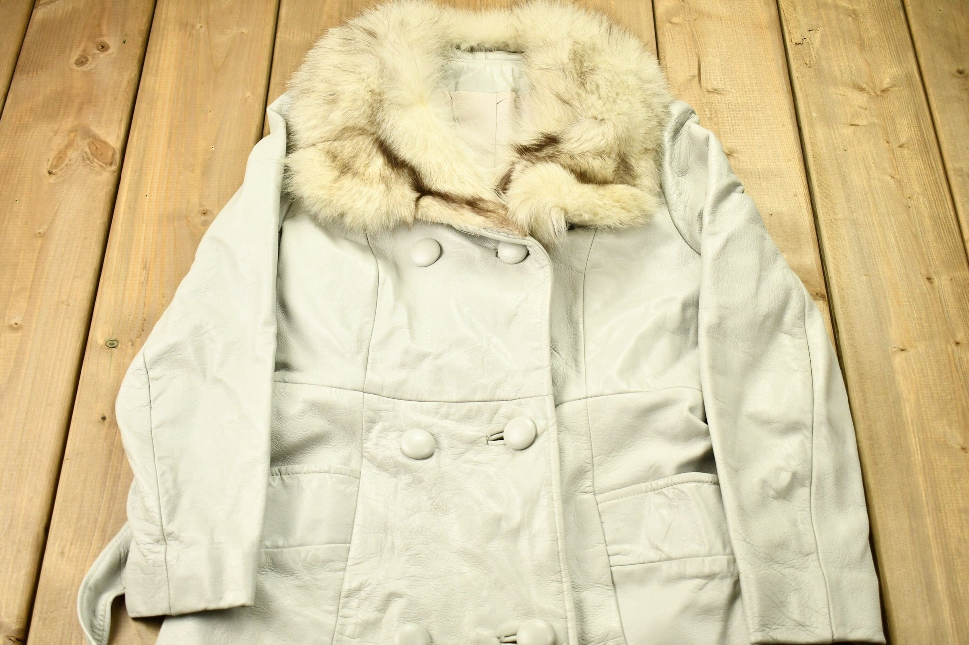 Vintage 1970s Off White Leather With Grey Fox Trim Penny Lane Trench Coat from propervintagecanada