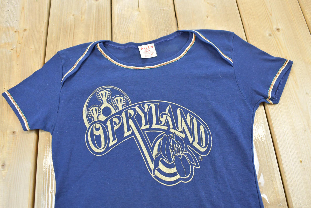 Vintage 1970s Opryland Nashville Souvenir Travel T Shirt Baby Tee Womens XS from propervintagecanada