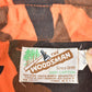 Vintage 1970s The Woodsman Orange Camo Button Up Shirt Mens L from propervintagecanada